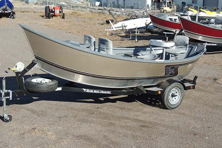 tan aluminum drift boat
