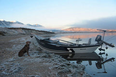 Drift boat on lake with motor