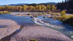 power drift boat maneuvering through channels on the South Fork of Snake River